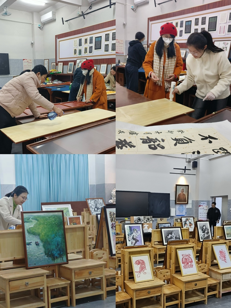 图2：教师集体装裱并布置元旦书画展.jpg